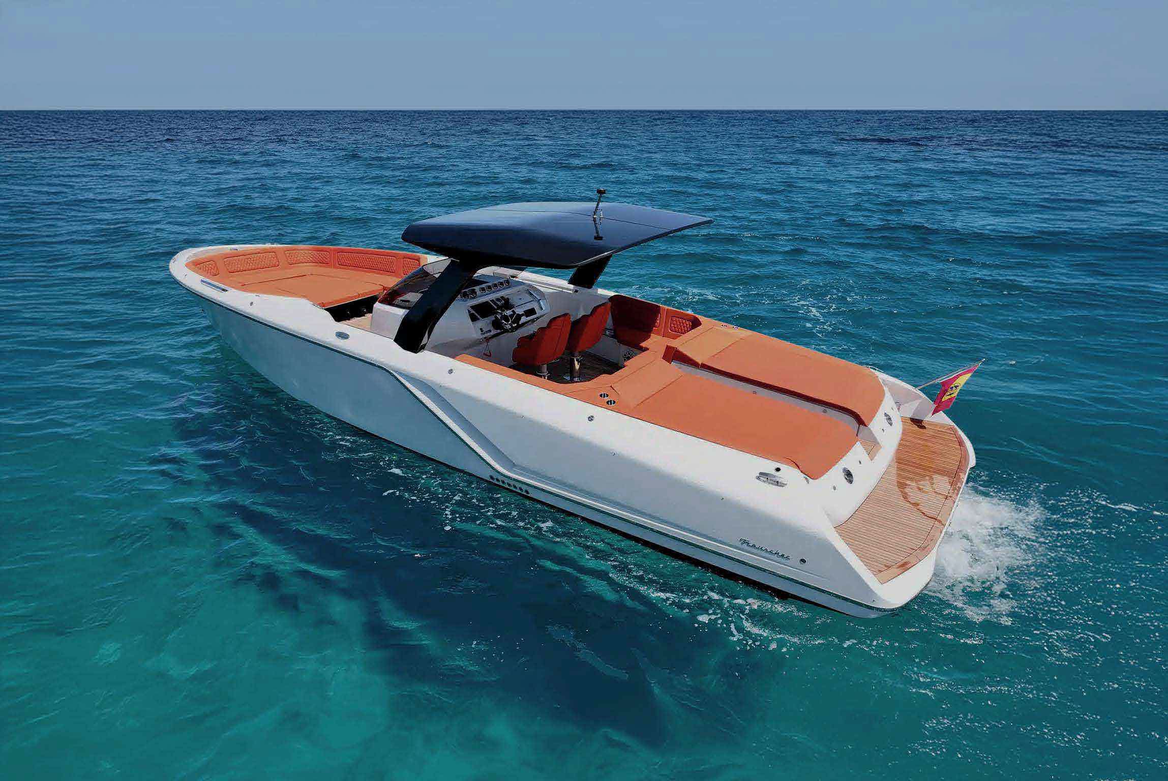 Aerial view of a Frauscher 40 Viena on turquoise water.