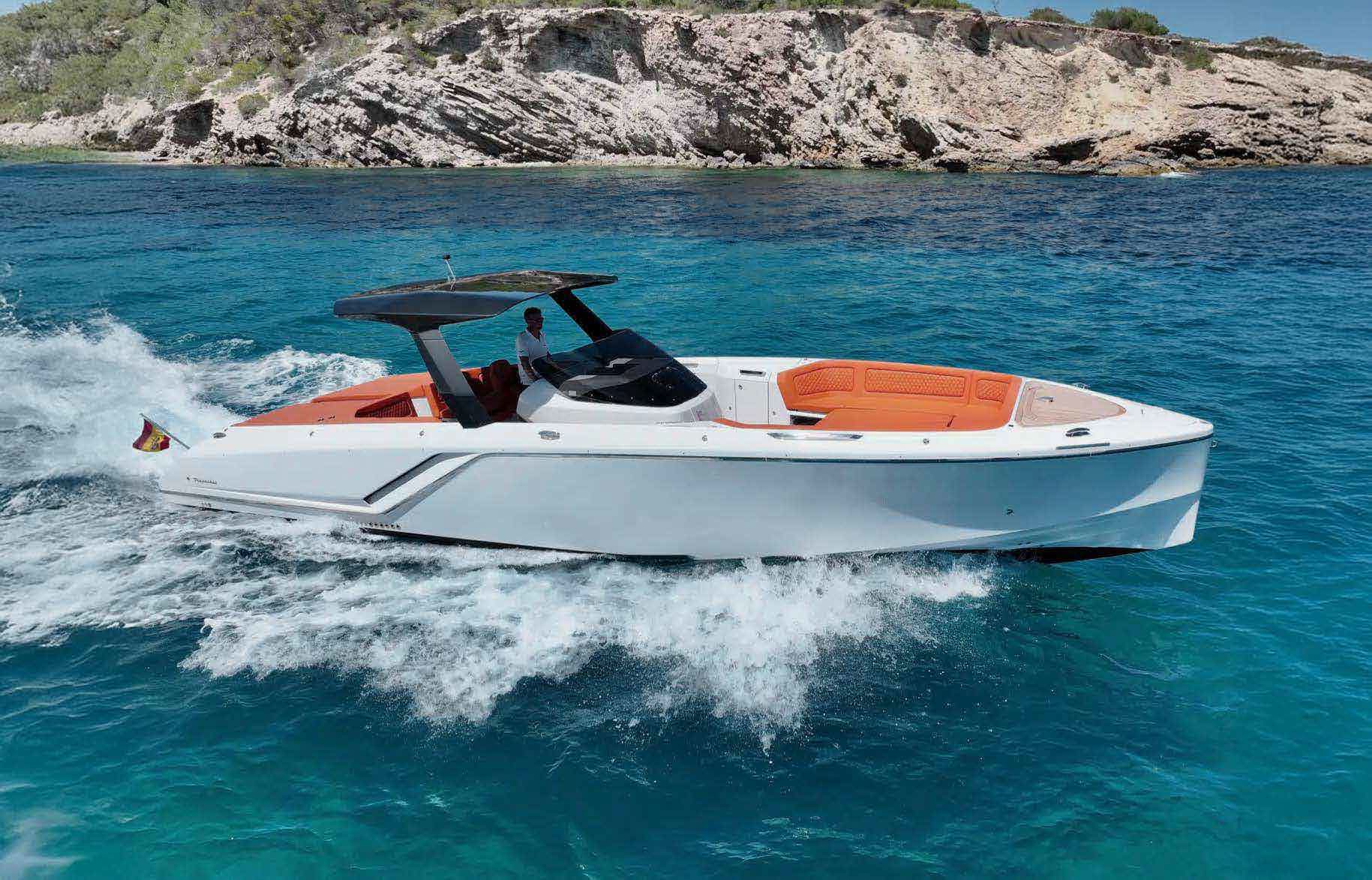 A Frauscher 40 Viena cruising along the Ibiza coastline.